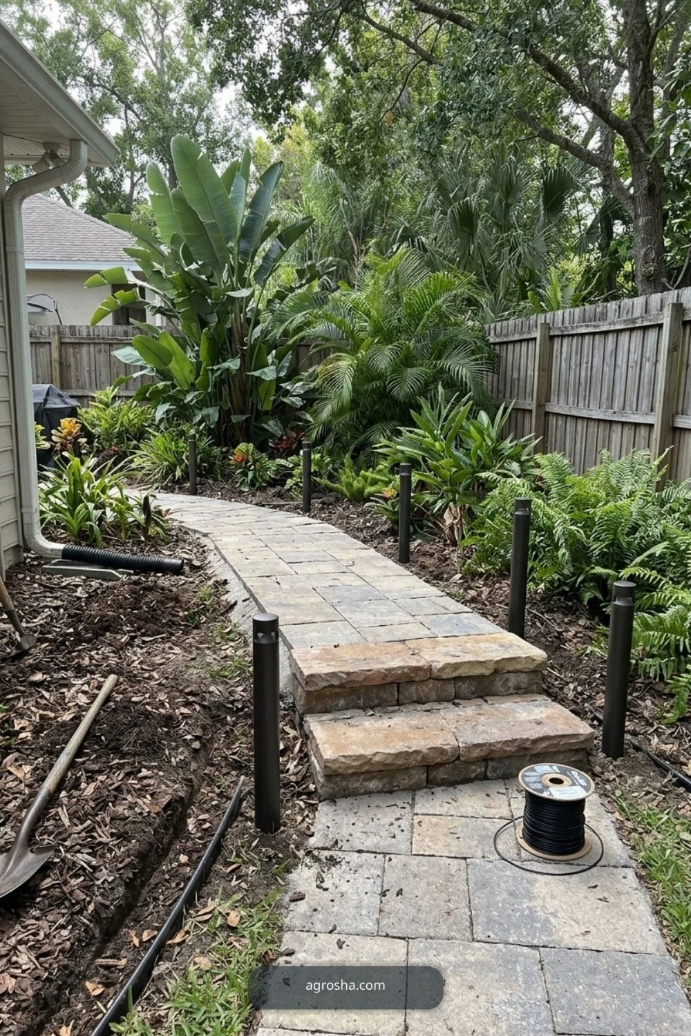 Florida backyard upgrade example showing light the main path and steps