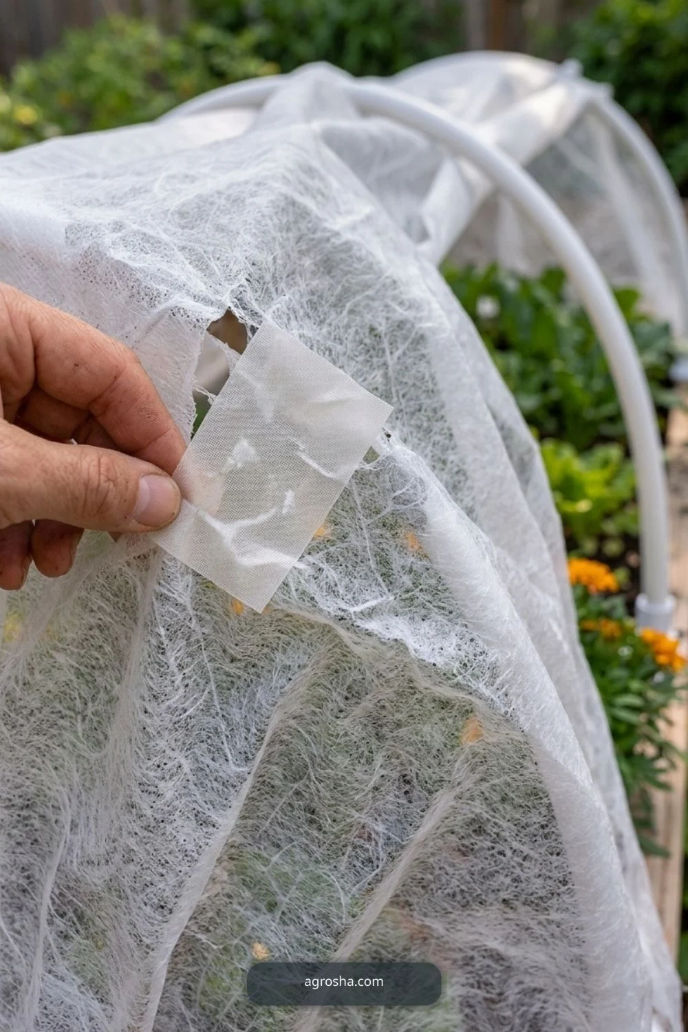 Torn cloth repair for DIY mini greenhouse for raised beds