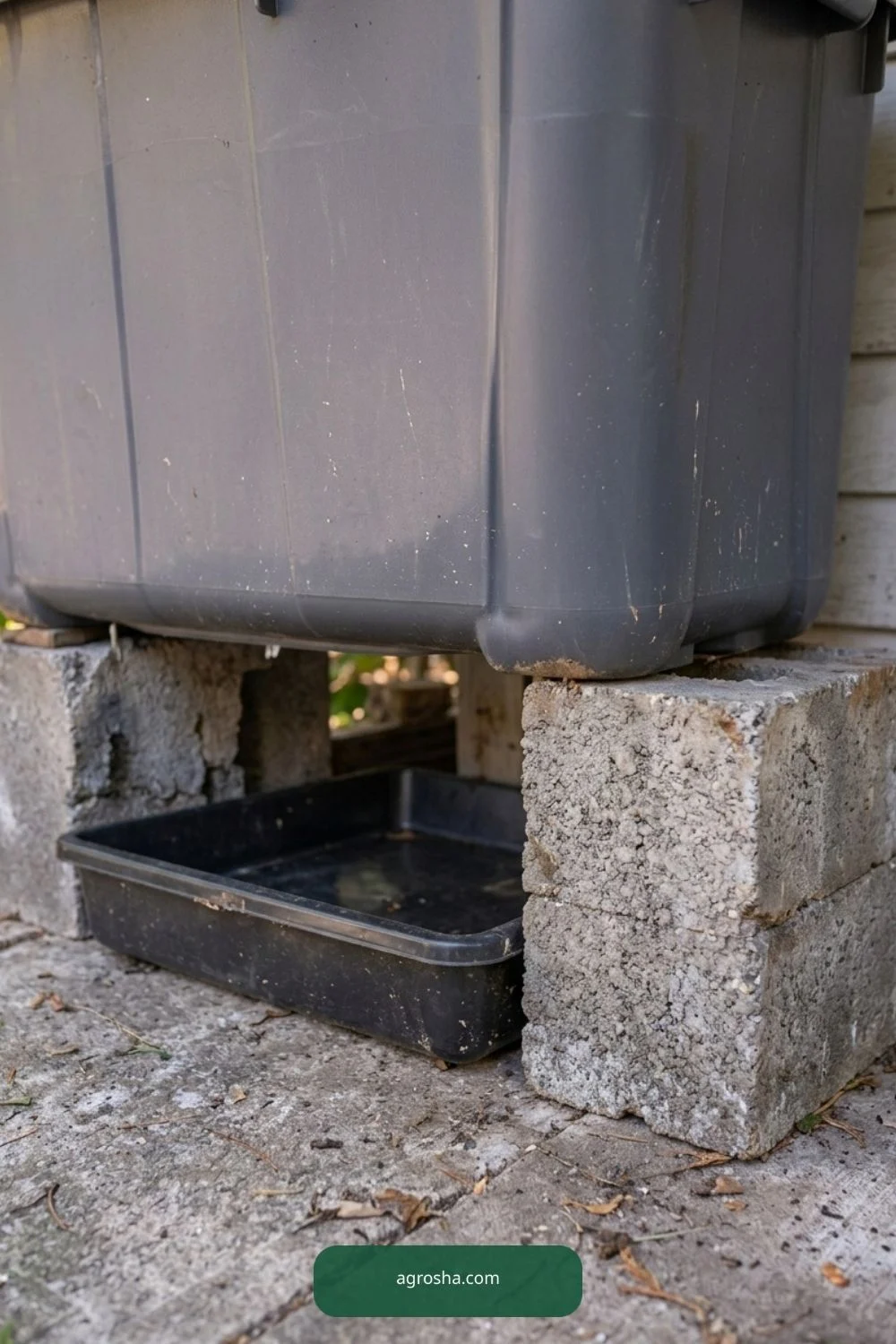 Raise bin over tray for DIY worm composting station outdoors