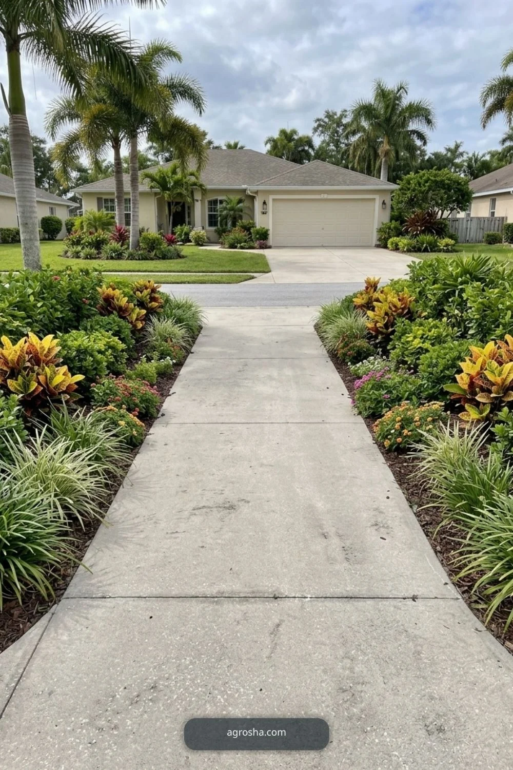 Florida driveway border showing matching low planting on both sides