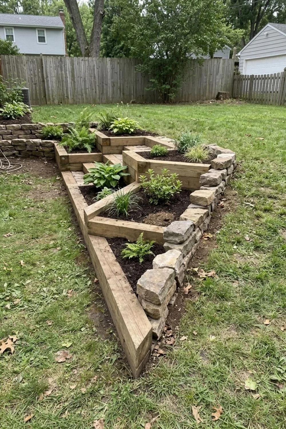 Terraced Slope Border defining a flower bed in a suburban backyard
