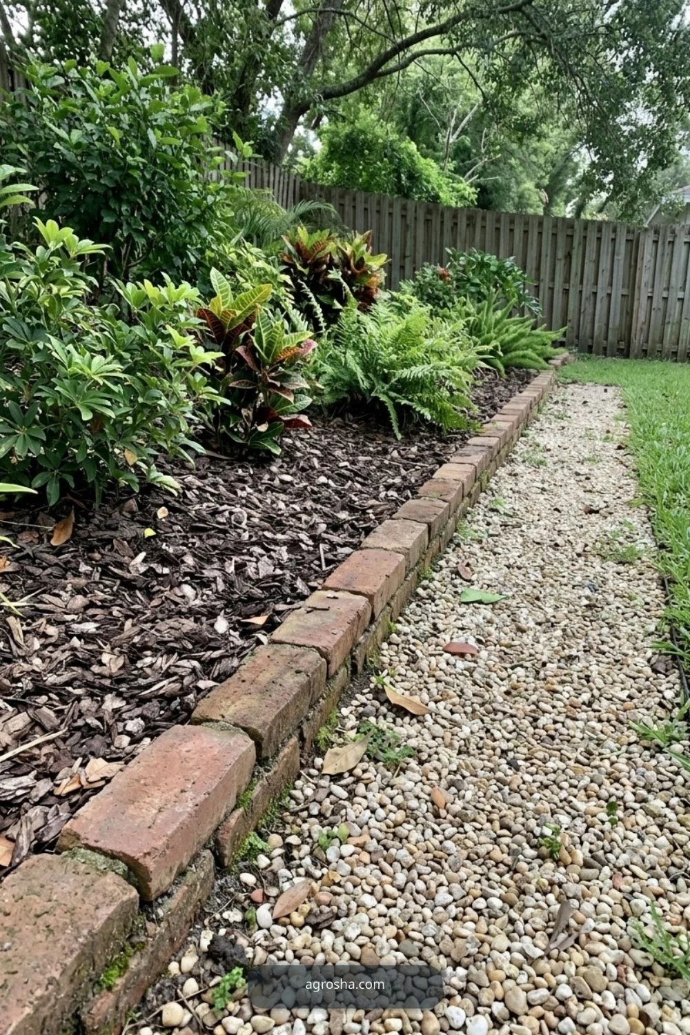 Florida landscape edging example showing brick edge along a garden path