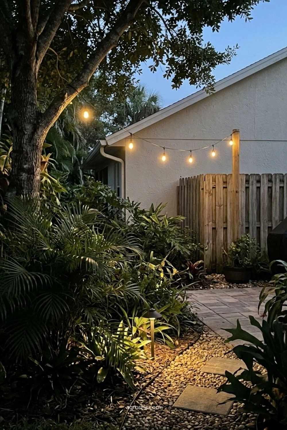 Florida garden lighting example showing string lights used sparingly