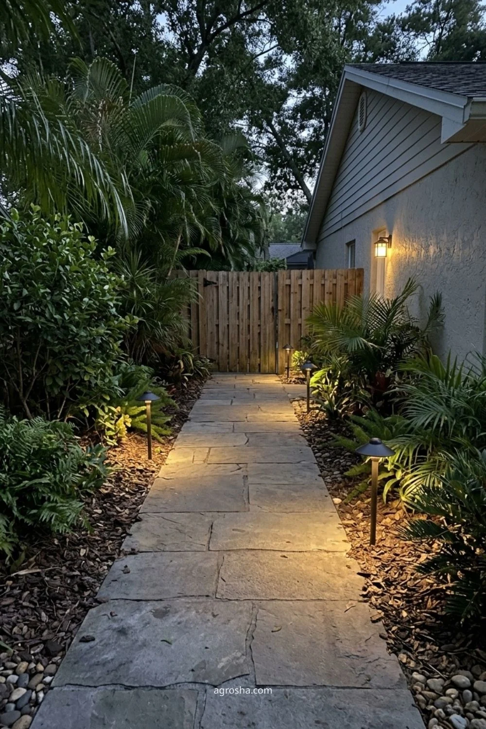 Florida garden lighting example showing low-voltage bollards for a wider walk