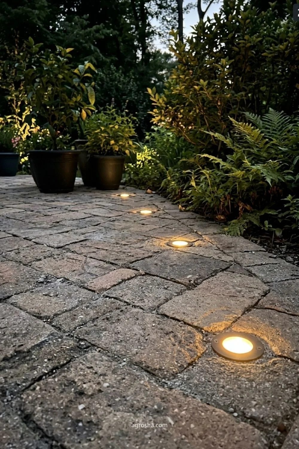 Florida garden lighting example showing flush paver lights at a landing