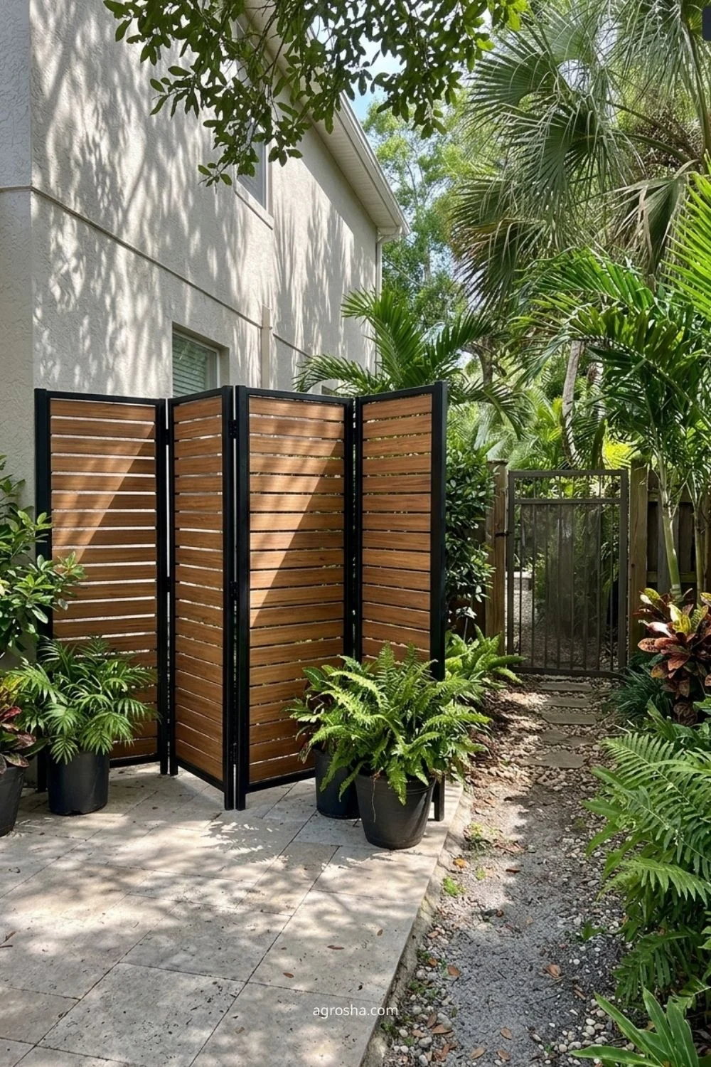 Florida privacy screen example showing hinged multi-panel outdoor divider