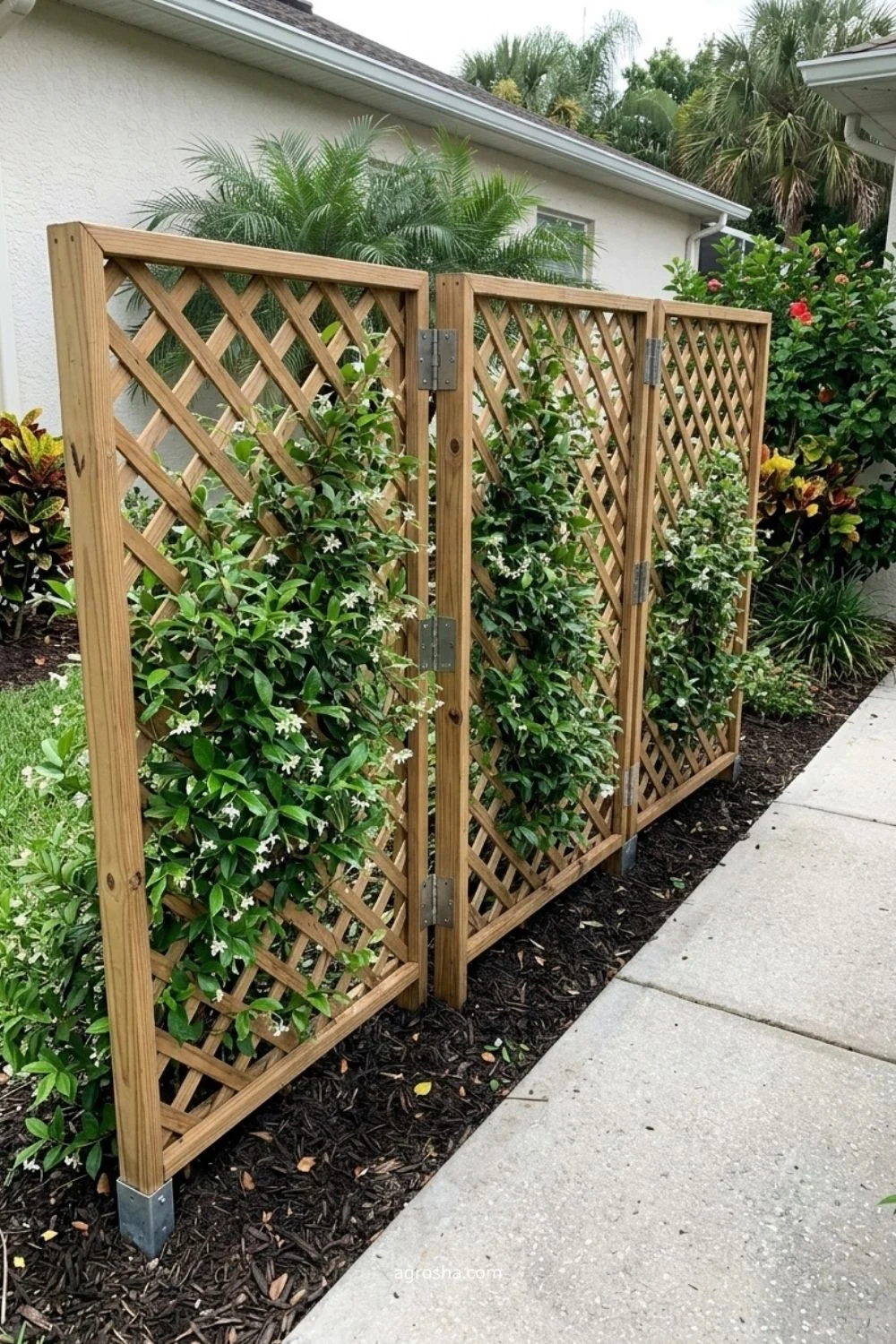 Florida garden trellis example showing hinged trellis panels for adjustable screening