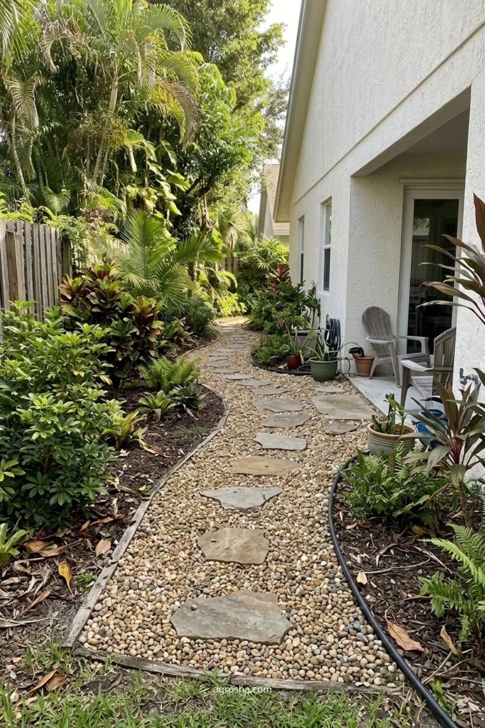 Florida gravel path showing side-yard gravel walkway
